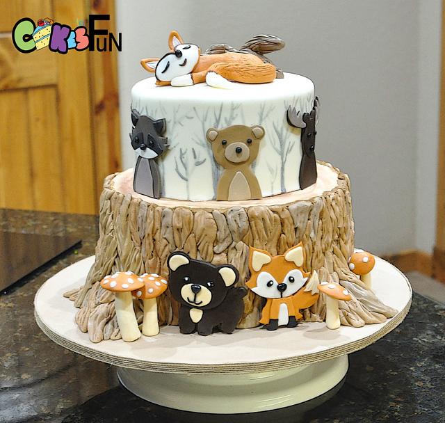 Tree stump with Wildlife - Decorated Cake by Cakes For - CakesDecor