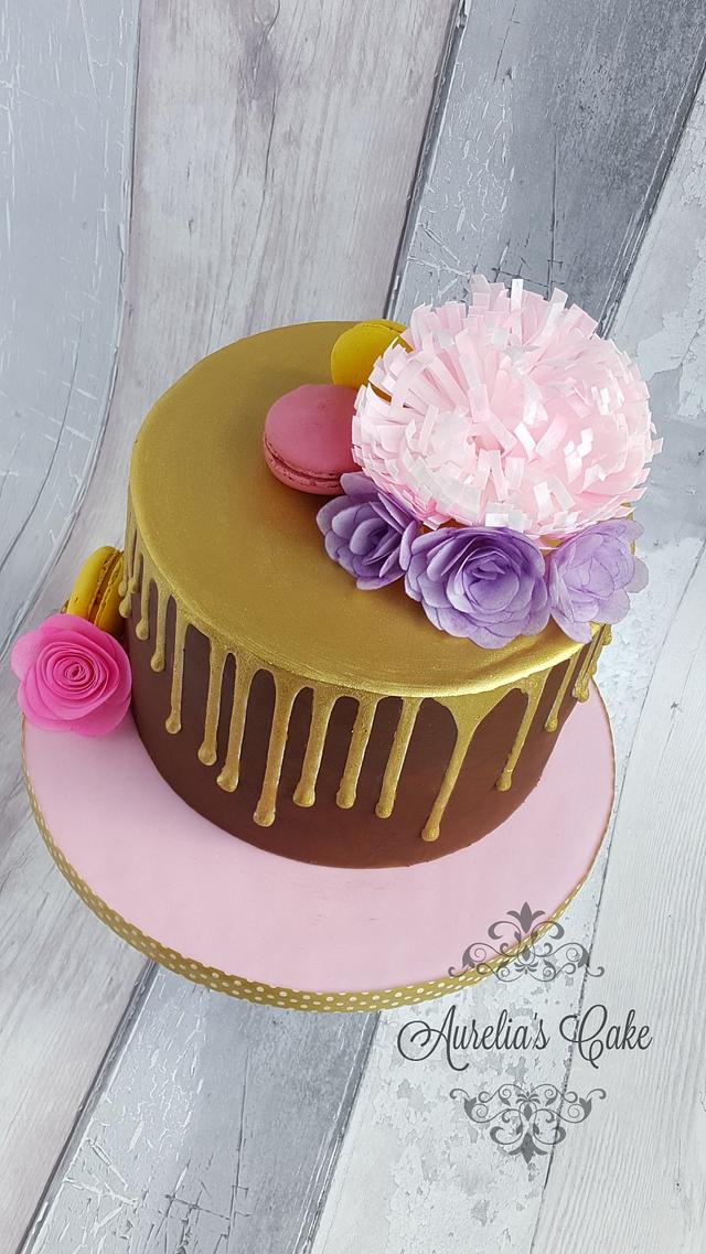 Gold drip cake with wafer paper flowers