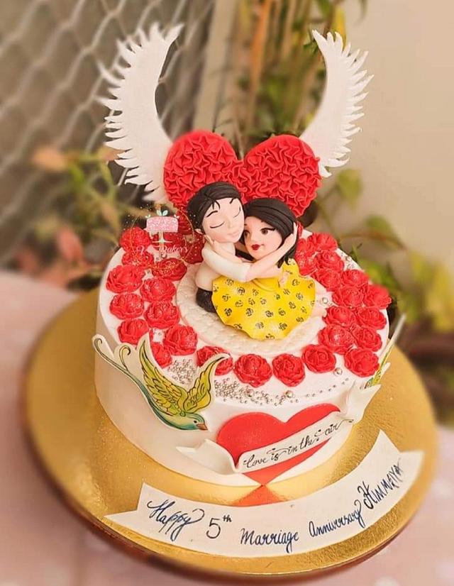 A cute 5th anniversary cake 🎂 A two... - Creamy Addictions | Facebook
