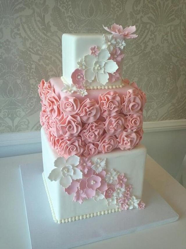 Pink Rosette - Decorated Cake by Ester Siswadi - CakesDecor