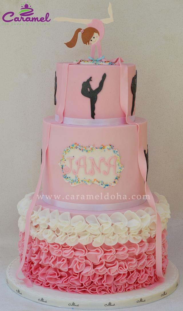 Gymnast Cake - Cake by Caramel Doha - CakesDecor