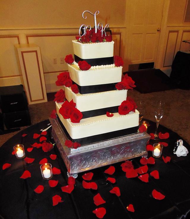 Red and black wedding cake in buttercream 