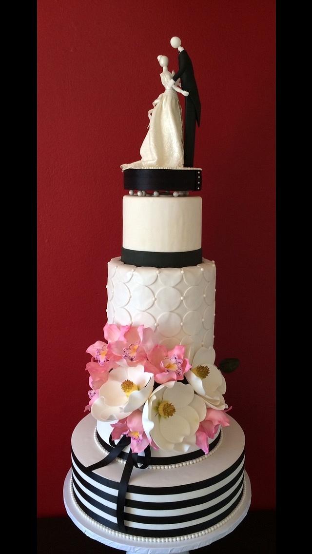 Pink orchids and magnolias wedding cake - Decorated Cake - CakesDecor