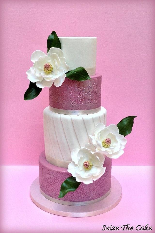 Wedding Cake with sugar magnolias - Decorated Cake by - CakesDecor