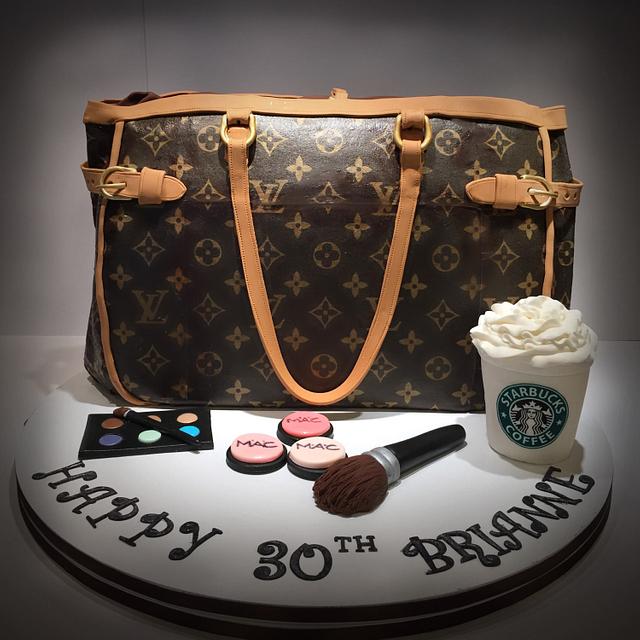 Louis Vuitton Handbag shaped cake covered in white fondant…