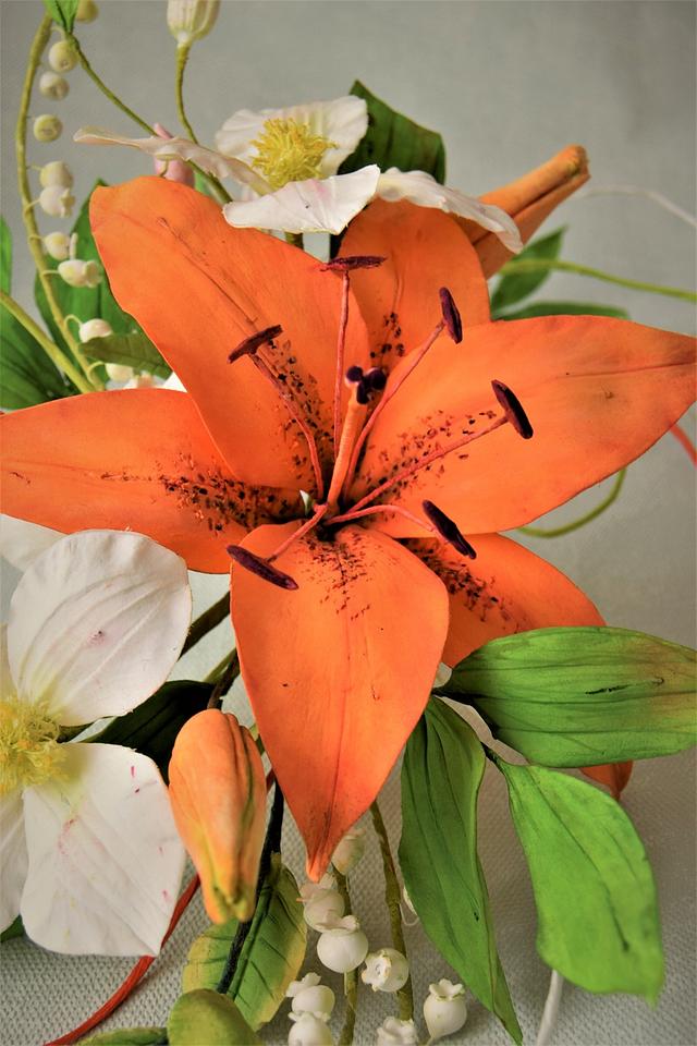 Tiger lily flower arrangement Cake by Zlatina Lewis CakesDecor