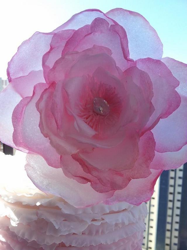 Ruffle pink cake with rice paper flowers Cake by CakesDecor