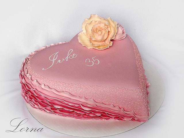 Pink heart & ruffles.. - Decorated Cake by Lorna - CakesDecor