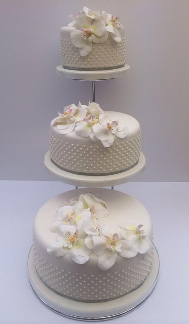 Orchid wedding cake - Decorated Cake by Julie Hudson - CakesDecor