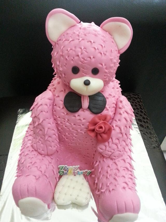 flowers cake and teddy bear