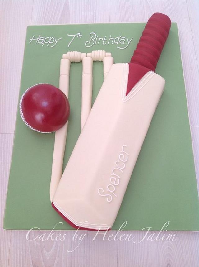 Cricket bat and ball Decorated Cake by helen Jane Cake CakesDecor