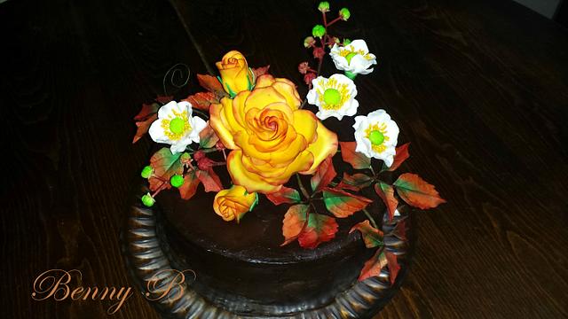 Chocolate cake with autumn flowers