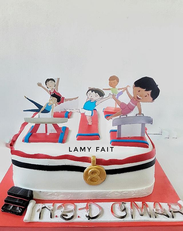 Gymnasium boy cake Decorated Cake by Randa Elrawy CakesDecor