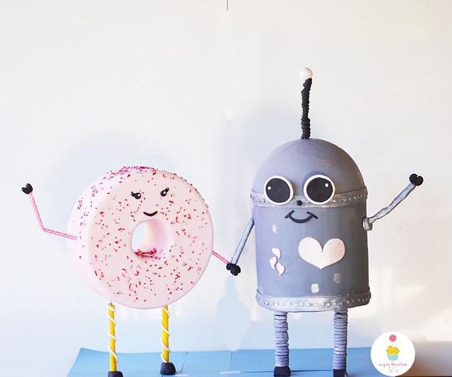 A donut and a robot fell in love! Decorated Cake by CakesDecor