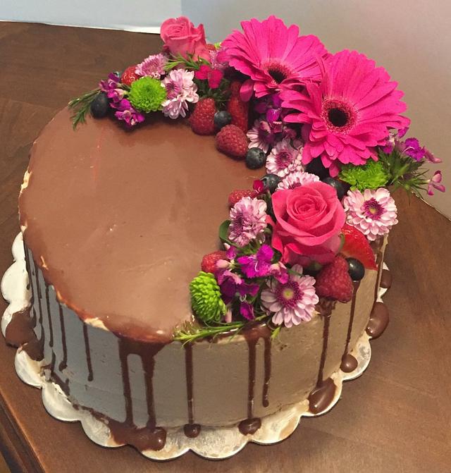 Chocolate and flowers Decorated Cake by Cakes By Casey CakesDecor