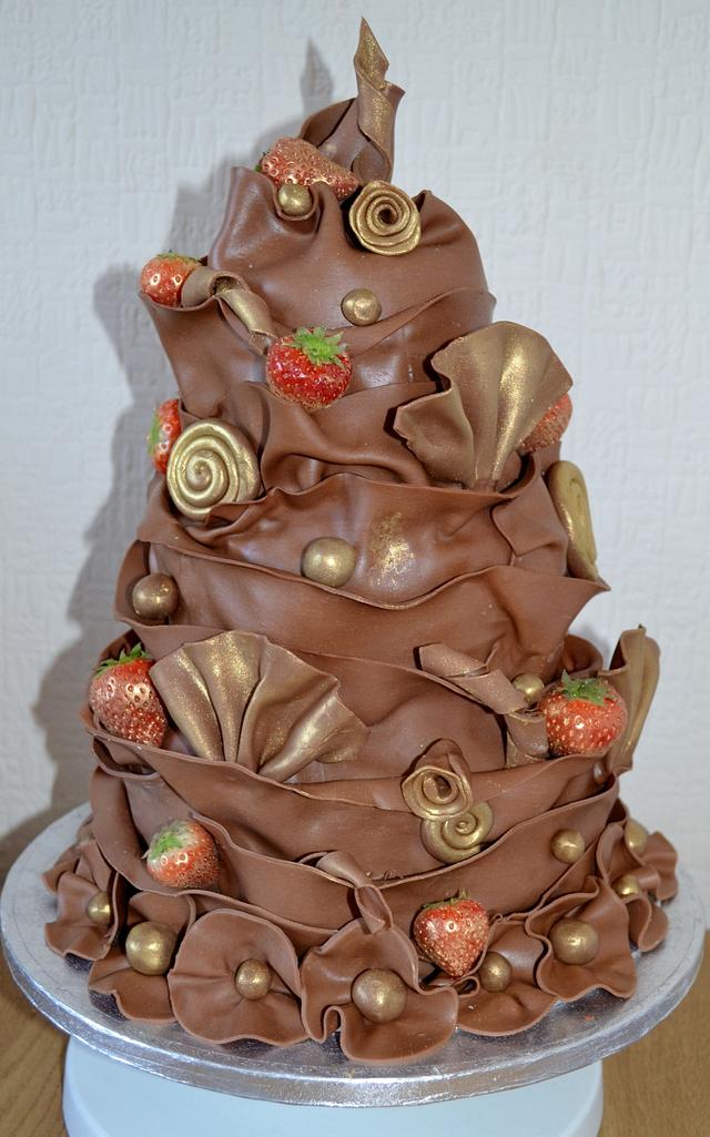 A few chocolate wrap cakes Cake by Jade Patching CakesDecor