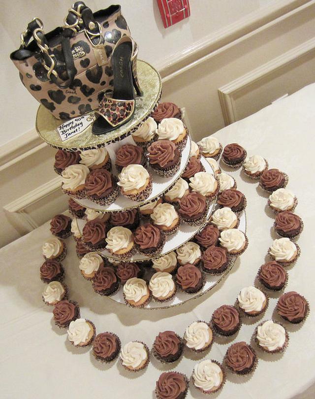 Leopard cupcake tower Cake by TrulyCustom CakesDecor