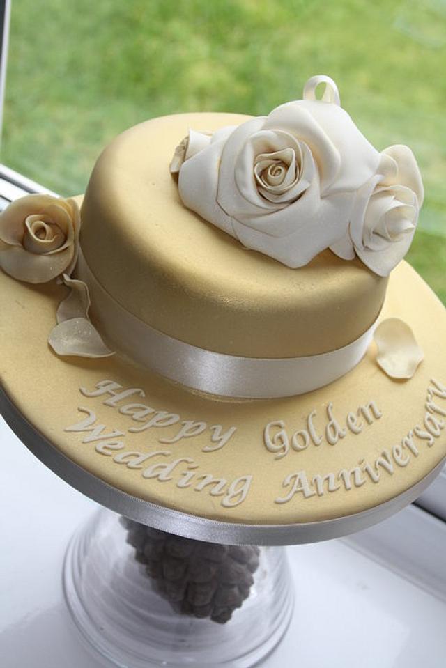 Golden wedding anniversary - Decorated Cake by - CakesDecor