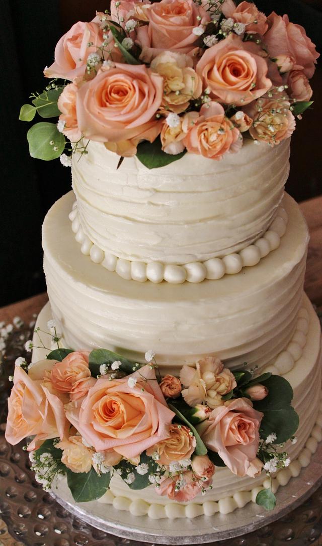 buttercream peach wedding cake - Decorated Cake by Nancys - CakesDecor