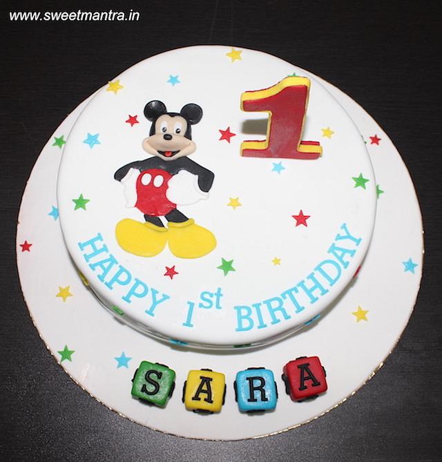 Mickey mouse theme fondant cake for girl's 1st birthday - - CakesDecor