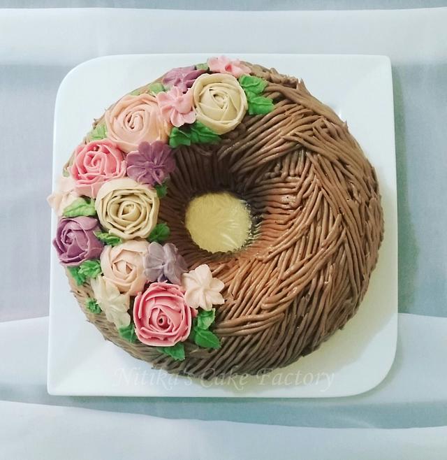 decorating a bundt cake with flowers