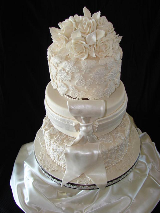 Wedding Cake w/Lace, Bow and Roses - Cake by vpardo53 - CakesDecor