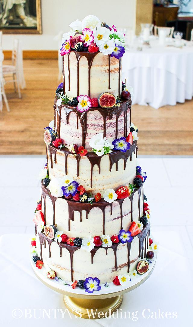 Semi Naked Drip Cake Decorated Cake By Bunty S Wedding Cakesdecor