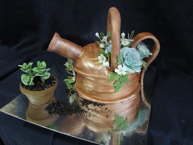 Growing oregano cupcake and tin shower plants cake