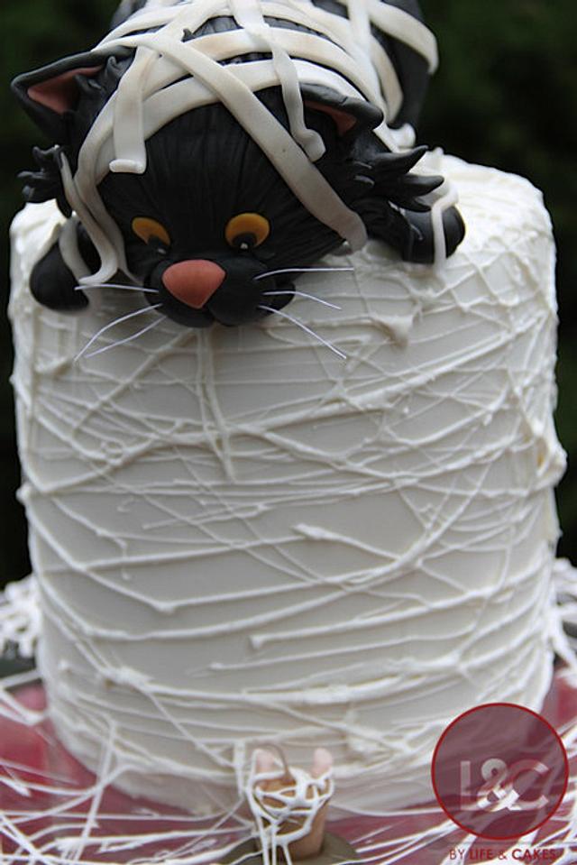 Mummy black cat birthday cake ... it's almost halloween