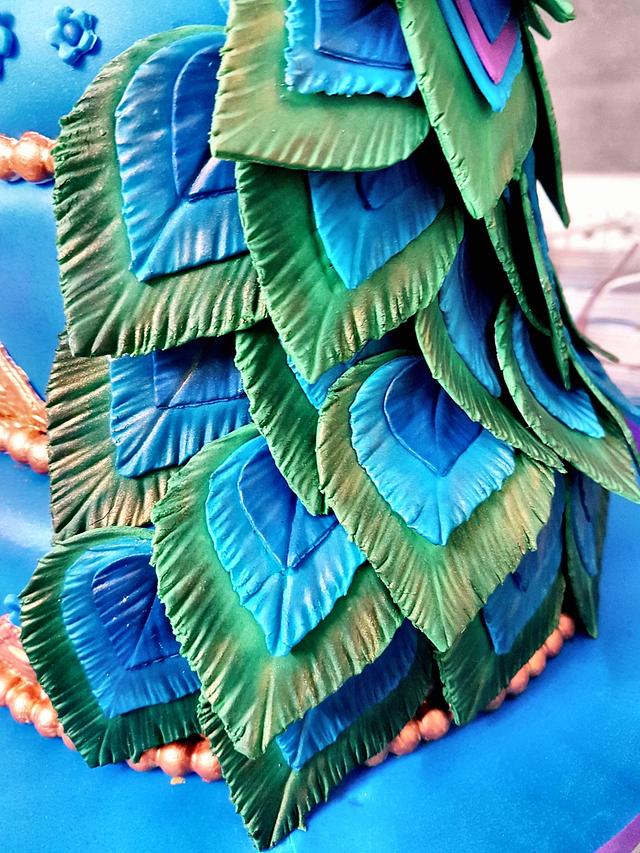 The Peacock themed Ring Ceremony cake
