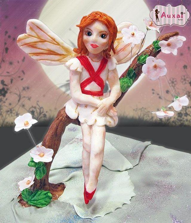 Modelling chocolate sculpture Decorated Cake by Auxai CakesDecor