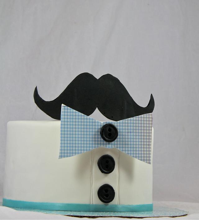 mustache and bowties - Decorated Cake by soods - CakesDecor