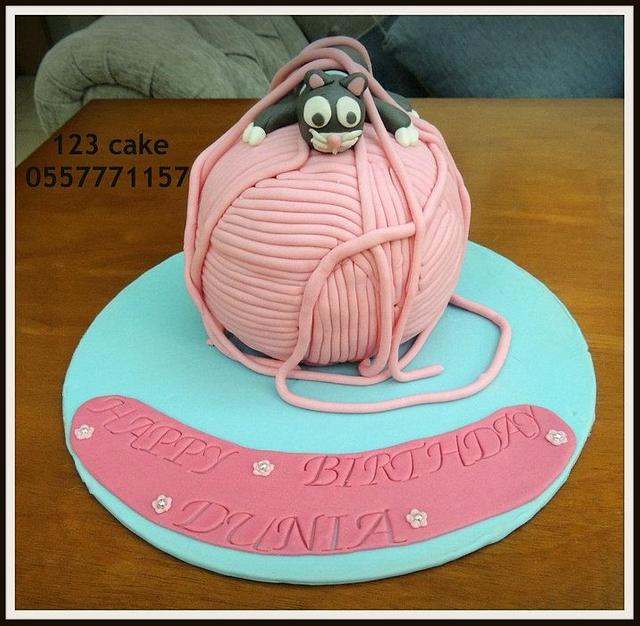 yarn cake Decorated Cake by Hiyam Smady CakesDecor