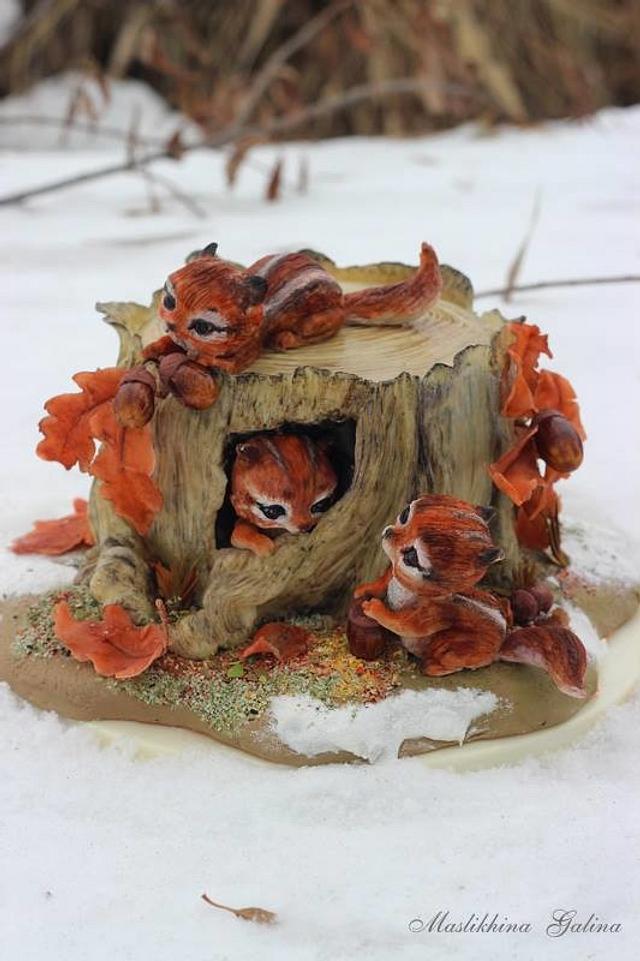 Chipmunks on an old stump
