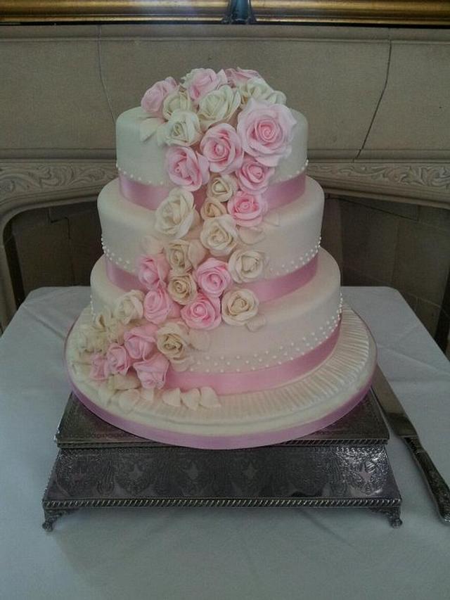 Pink And Ivory Cascading Roses Wedding Cake Decorated Cakesdecor 