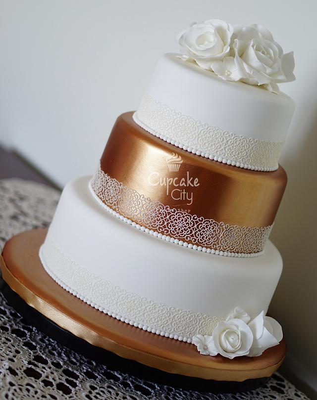 Golden Wedding Cake - Decorated Cake by CupcakeCity - CakesDecor