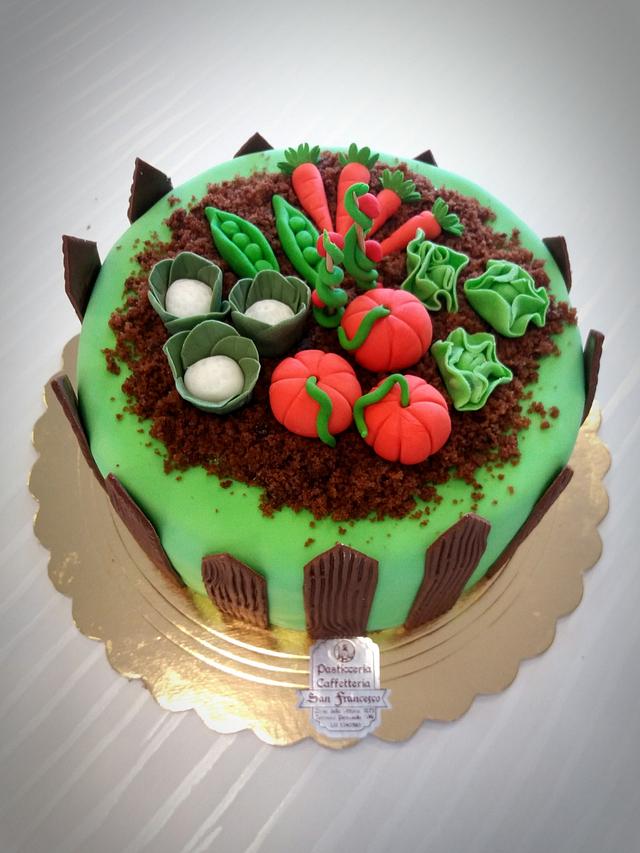 Vegetable garden cake Decorated Cake by Silvia Tartari CakesDecor