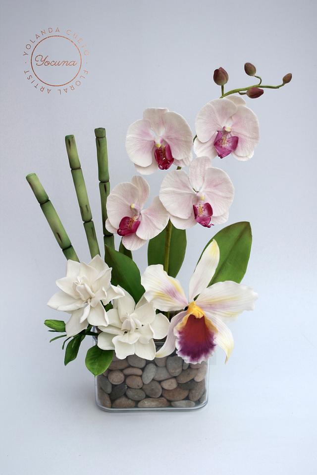 Bouquet of flowers in sugar. Phalaenopsis orchid, Cattleya orchid, Gardenias and Bamboo
