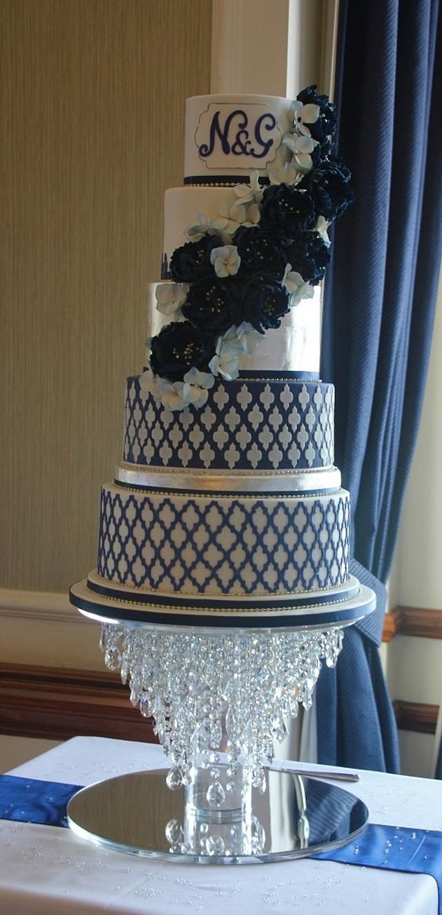 blue and silver wedding cakes with flowers
