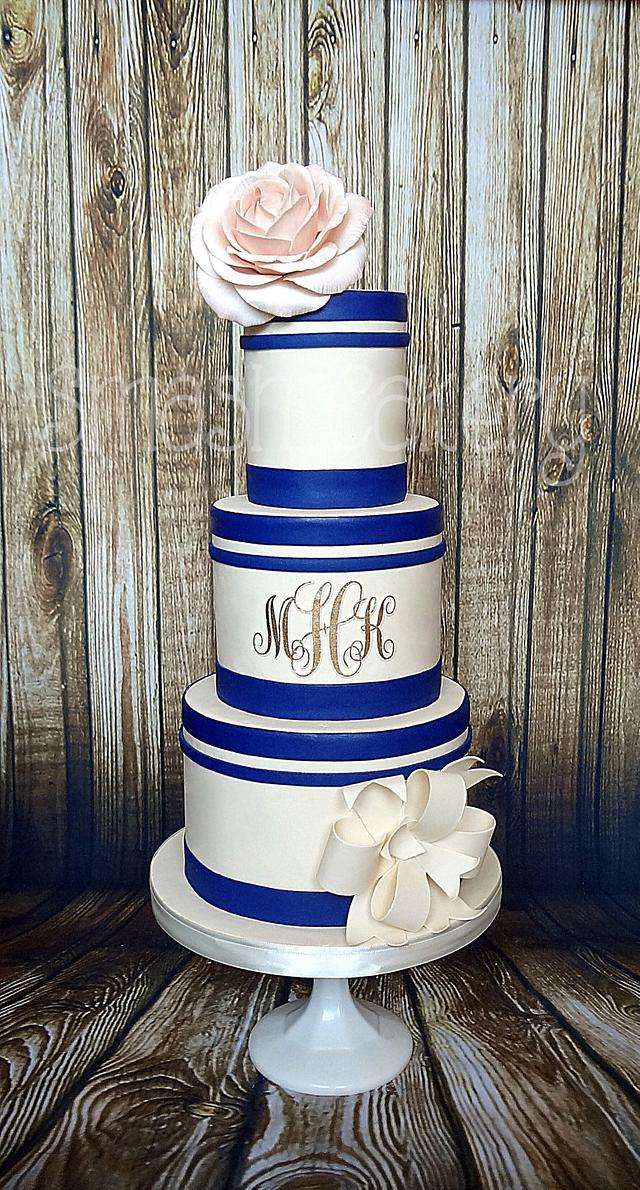 Navy, blush, and gold monogram wedding cake Cake by