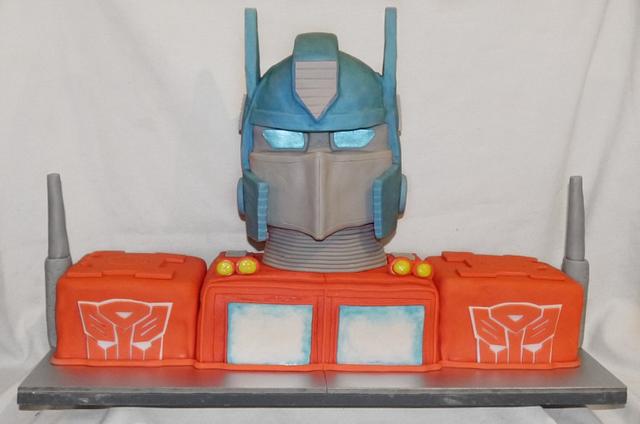 optimus prime cake - Decorated Cake by joe duff - CakesDecor