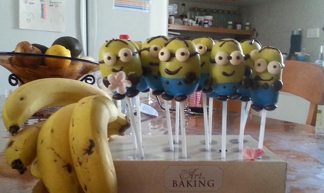 Minion Pops - Decorated Cake by The Custom Piece of Cake - CakesDecor