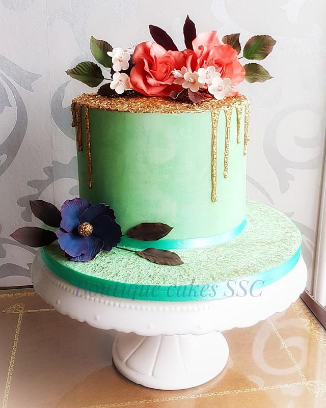Gold and teal flowers cake