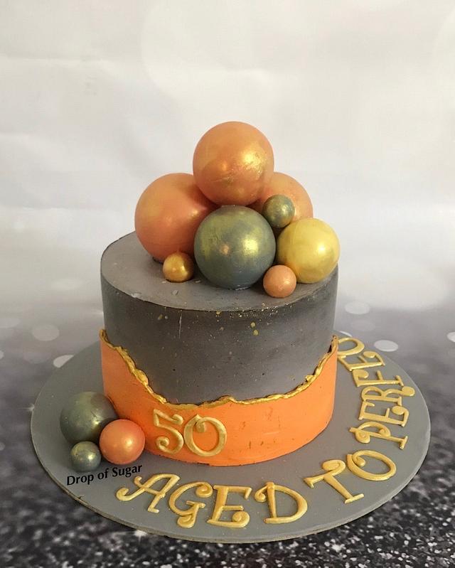 Fault Line Chocolate Spheres Cake Decorated Cake By Cakesdecor 3338