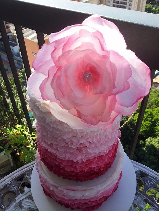 Ruffle pink cake with rice paper flowers Cake by CakesDecor