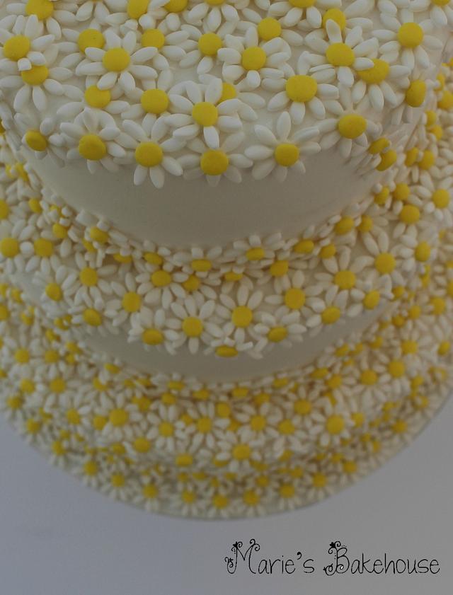 Cascading daisy wedding cake