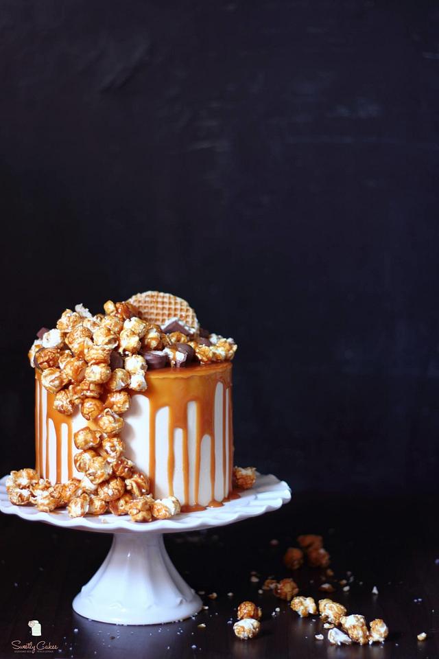 Cheesecake layered with salted caramel & popcorn Cake