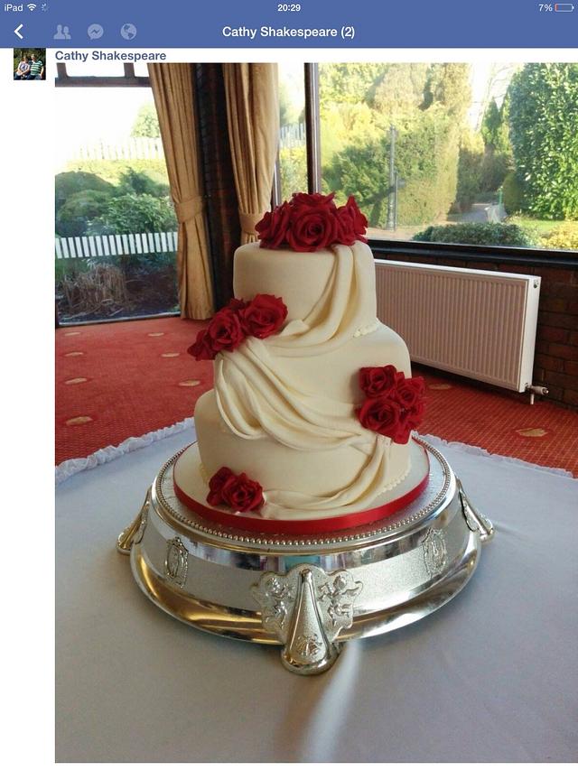 Rose and swag wedding cake