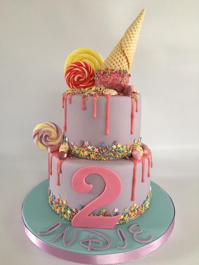 Ice cream drip cake - Decorated Cake by Amanda sargant - CakesDecor