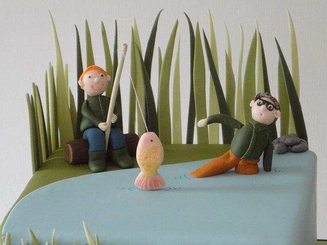 Fishing style cake with long grass